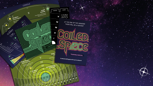 All the printed materials for Coiled.Spæce in front of a starscape